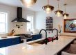 kitchen with workstation sink and no upper cabinets
