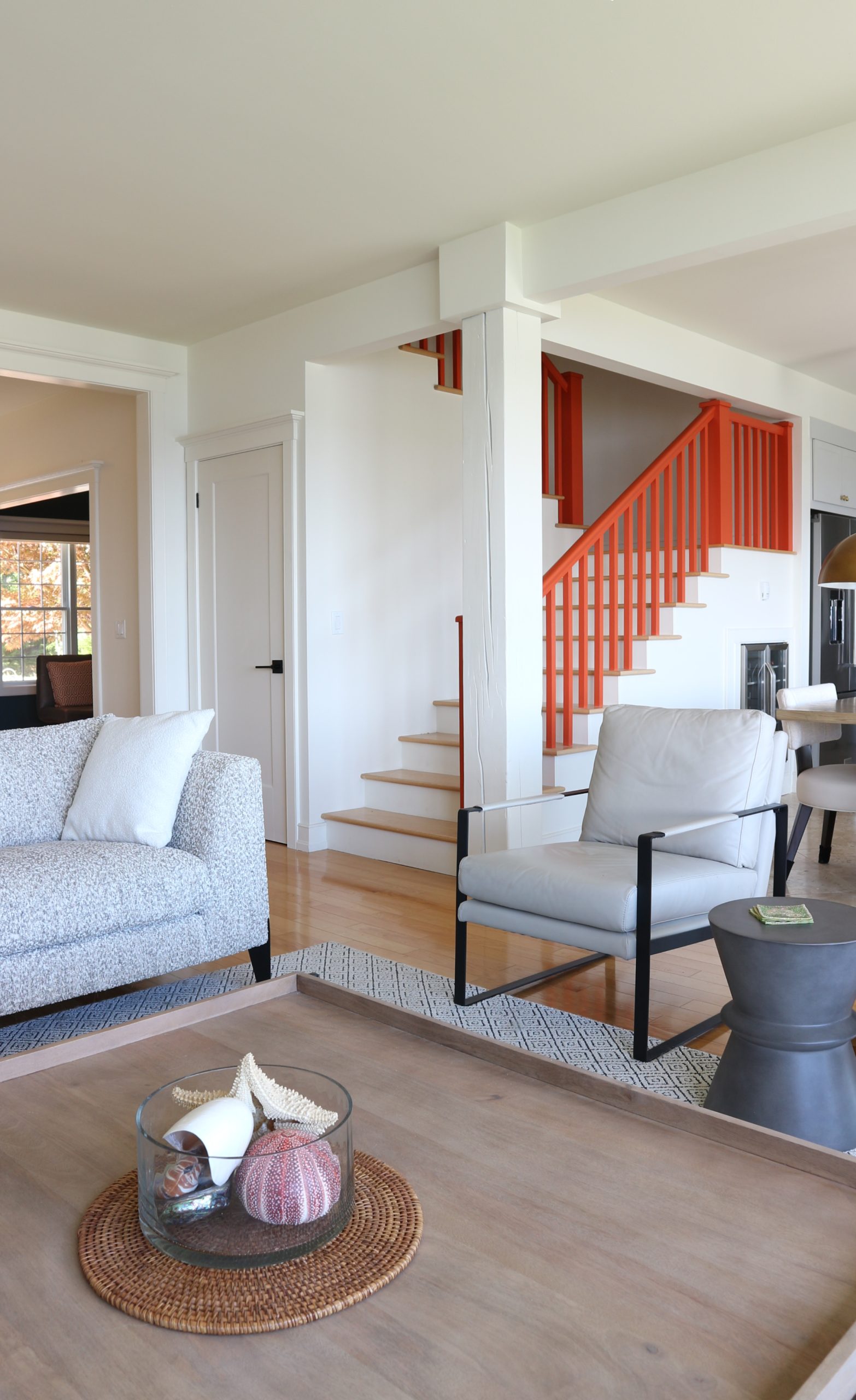 Farrow&Ball Charlotte's Locks staircase with modern living room furniture driftwood table in foreground