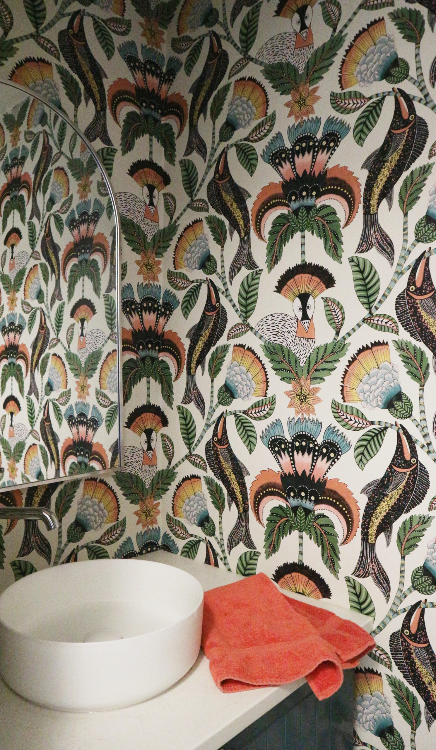 Cole&Sons Nene Wallpaper in powder room with round vessel sink