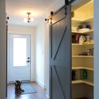 bright yellow pantry taupe barn door