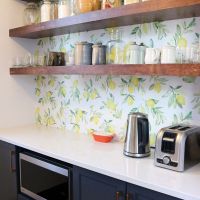 floating shelves with lemon wallpaper pantry blue cabinets
