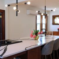 century home with modern lights and kitchen island