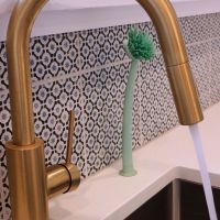 Modern Brass Sink Faucet black and blue geometric backsplash